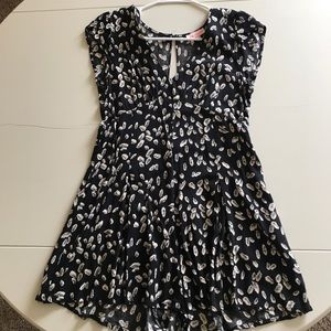 Black romper with feathers